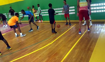 Coach Rick Walrond leading a youth training session