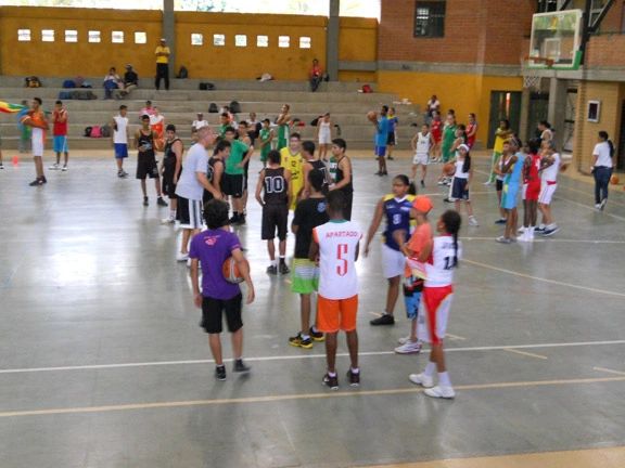 Coach Rick Walrond running a camp for the Colombia Basketball Federation in Medellín